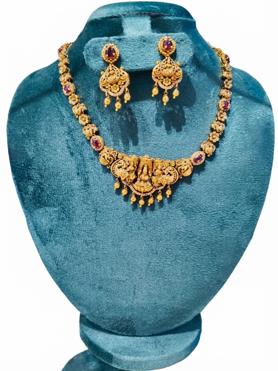 oyal Antique Gold-Plated Goddess Lakshmi Temple Necklace Set with Ruby Accents
