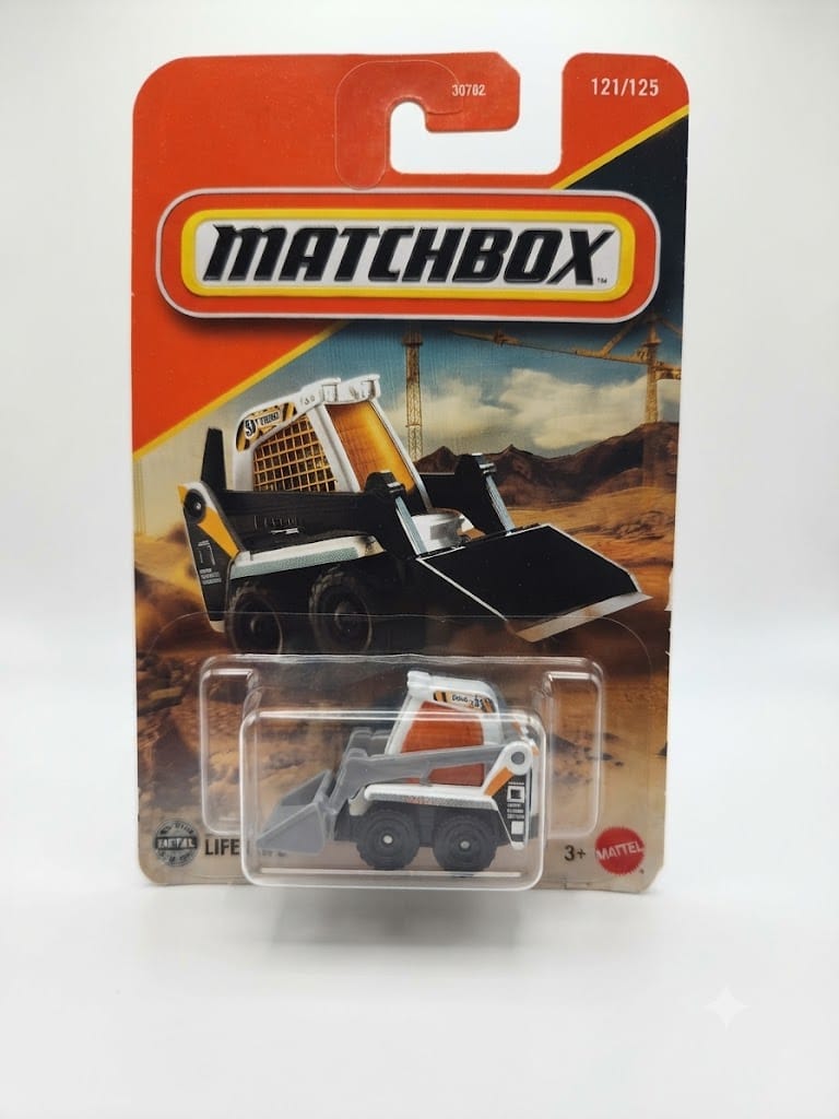 Matchbox Skidster – MBX Construction White & Orange Skid Steer Loader (121/125, 1:64 Scale Die-Cast Toy Vehicle)