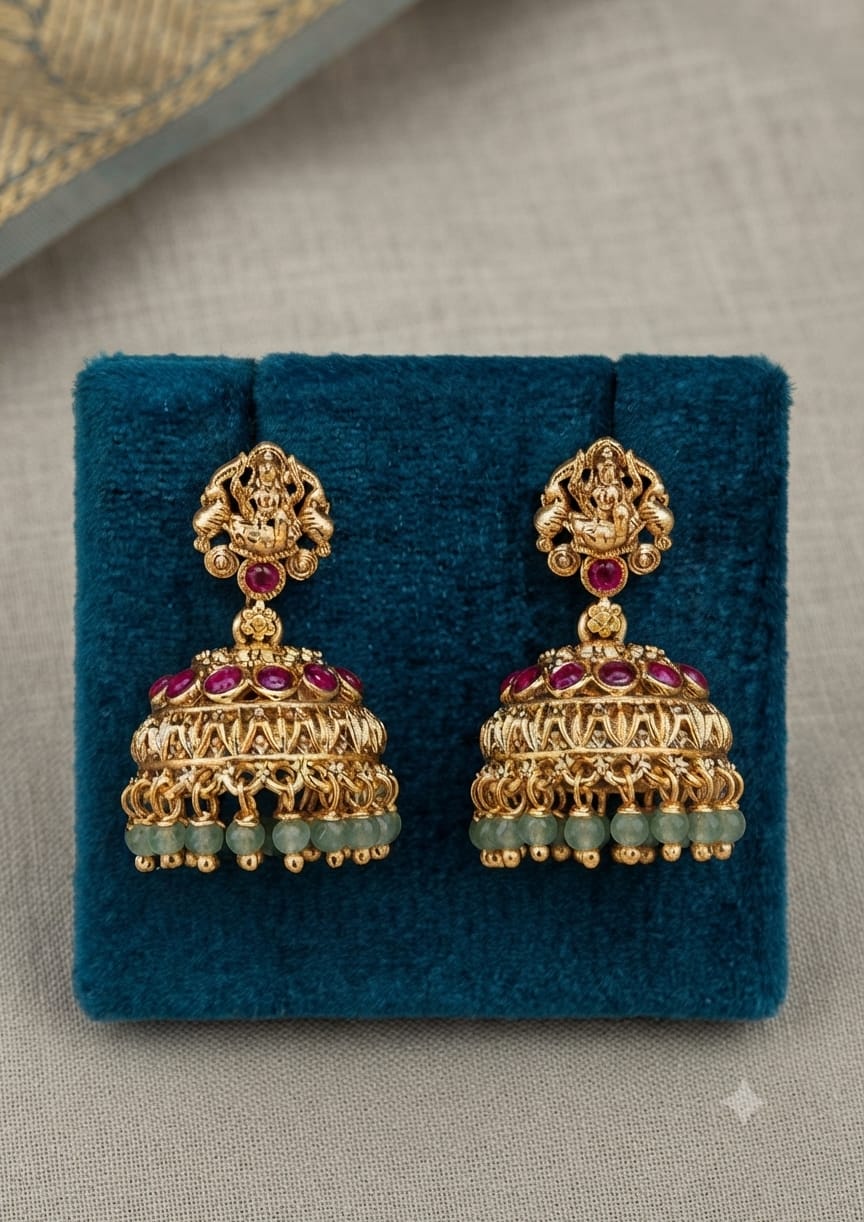 PUPAA Heritage Antique Gold Gaja Lakshmi Temple Jhumka Earrings with Ruby Stones & Light Green Bead Drops