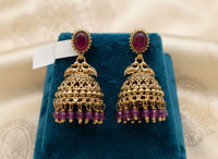 Antique Gold Dual Peacock Temple Jhumka Earrings with Oval Gemstone & Faceted Bead Drops