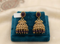Antique Gold Dual Peacock Temple Jhumka Earrings with Oval Gemstone & Faceted Bead Drops
