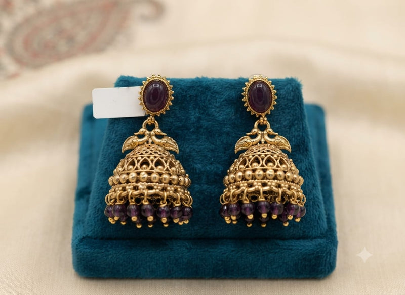Antique Gold Dual Peacock Temple Jhumka Earrings with Oval Gemstone & Faceted Bead Drops