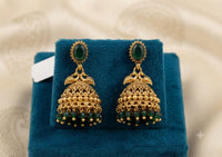 Antique Gold Dual Peacock Temple Jhumka Earrings with Oval Gemstone & Faceted Bead Drops