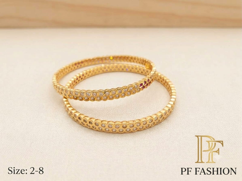 PF Fashion Sleek Dual-Row CZ Bangle Set with Ruby Pink Stone Accents